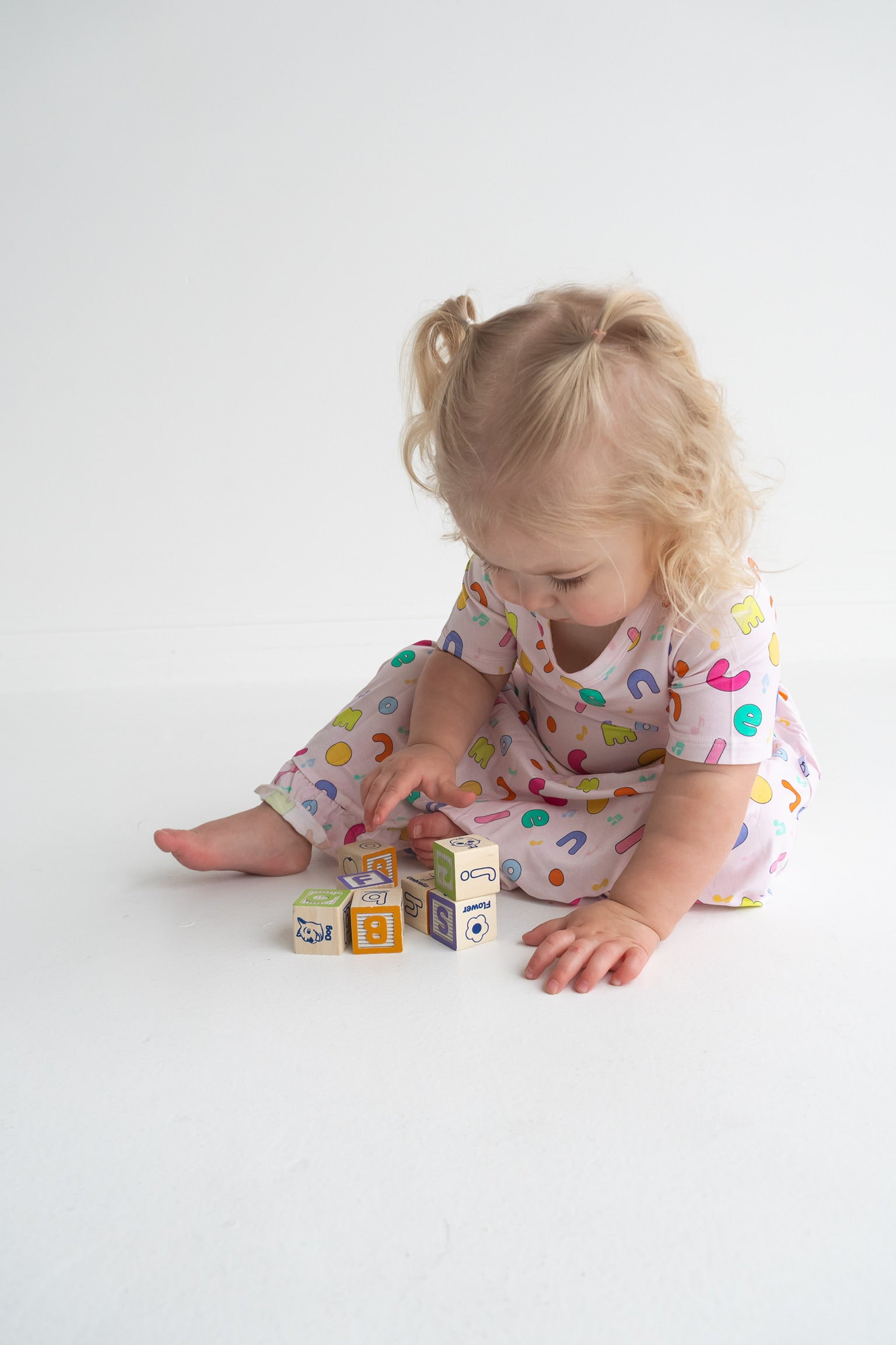 Dream Big Little Co x CoComelon ALPHABET SHORT SLEEVE DREAM RUFFLE DRESS