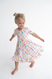 Dream Big Little Co x CoComelon ALPHABET SHORT SLEEVE DREAM RUFFLE DRESS