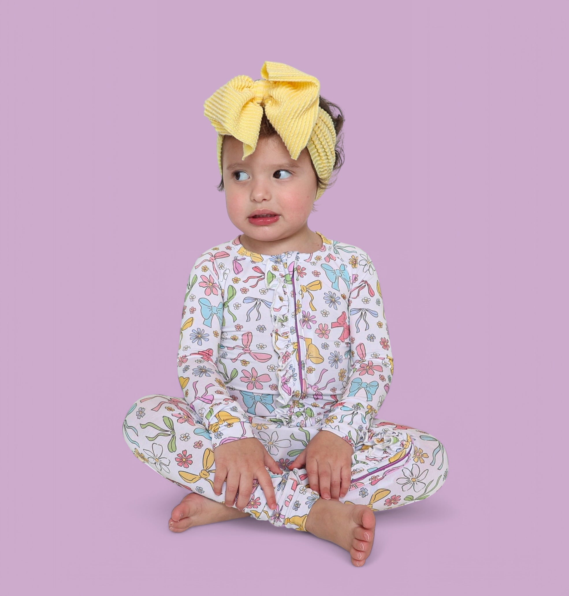 BOW GARDEN DREAM RUFFLE ROMPER
