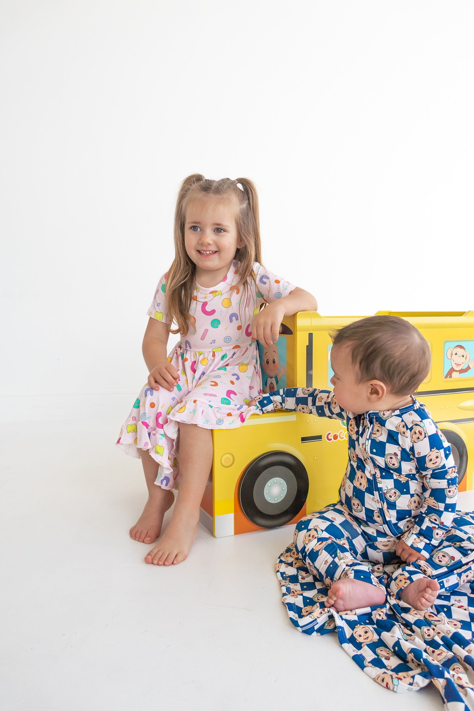 Dream Big Little Co x CoComelon ALPHABET SHORT SLEEVE DREAM RUFFLE DRESS