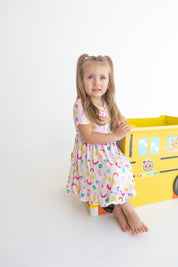 Dream Big Little Co x CoComelon ALPHABET SHORT SLEEVE DREAM RUFFLE DRESS