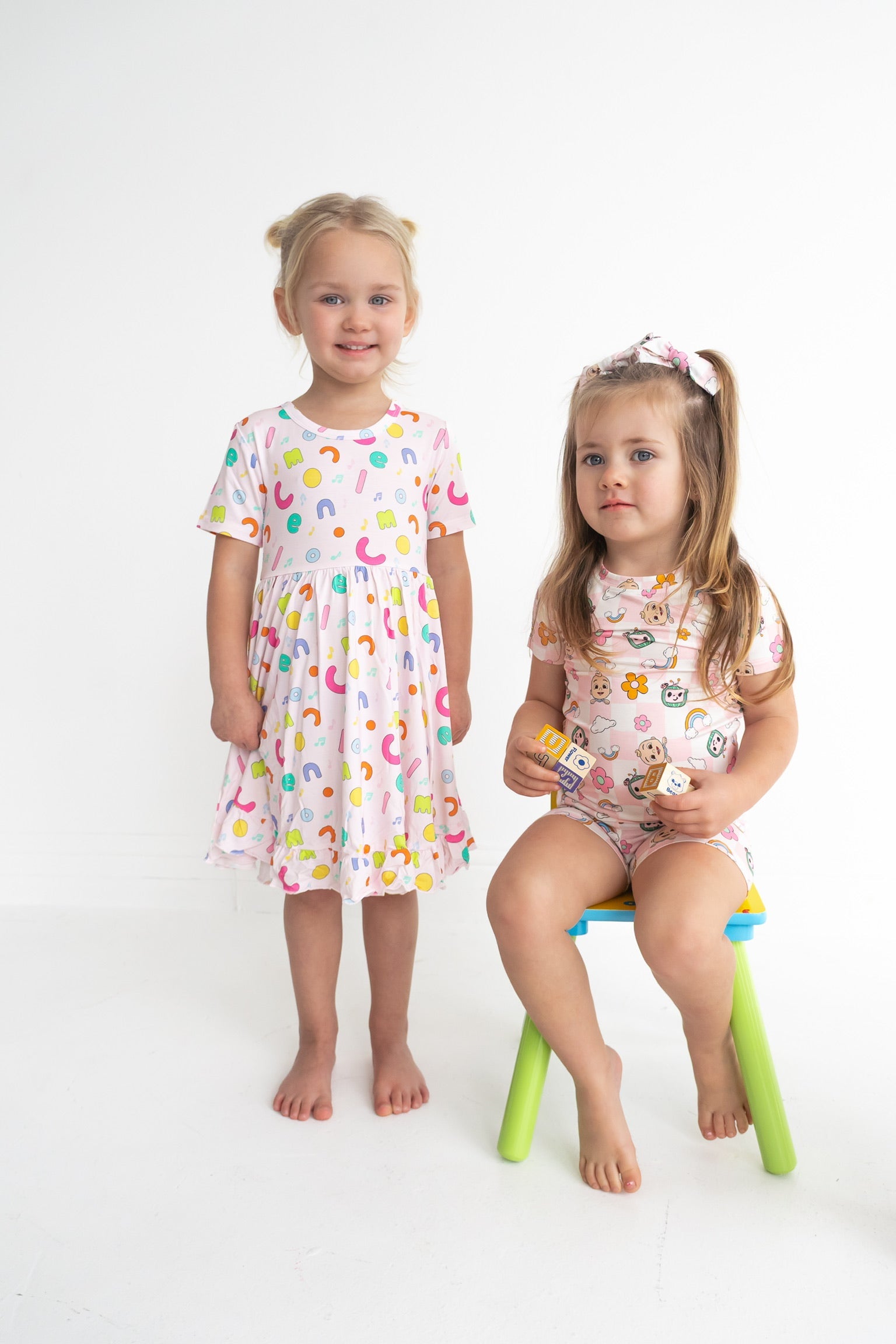 Dream Big Little Co x CoComelon ALPHABET SHORT SLEEVE DREAM RUFFLE DRESS