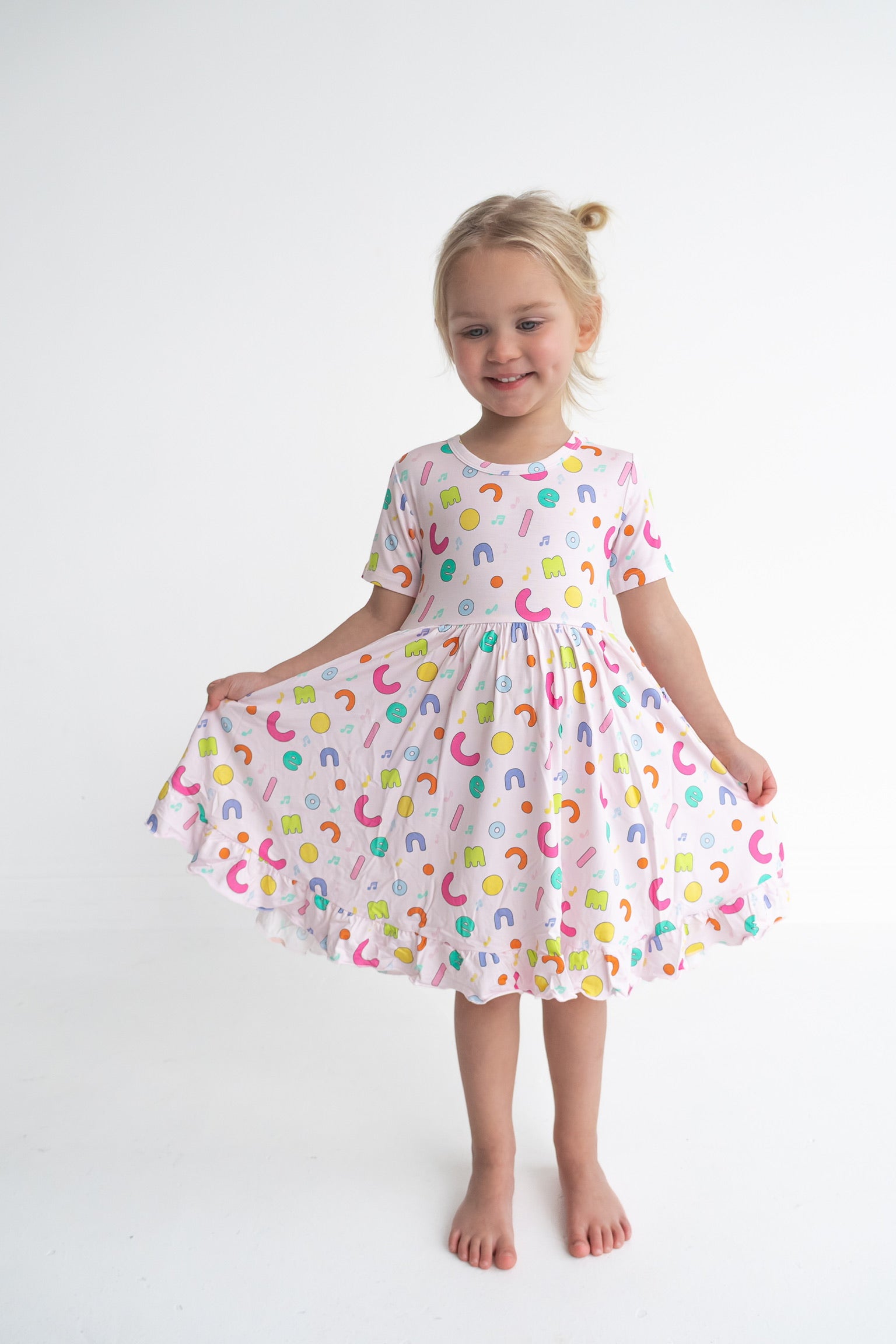 Dream Big Little Co x CoComelon ALPHABET SHORT SLEEVE DREAM RUFFLE DRESS