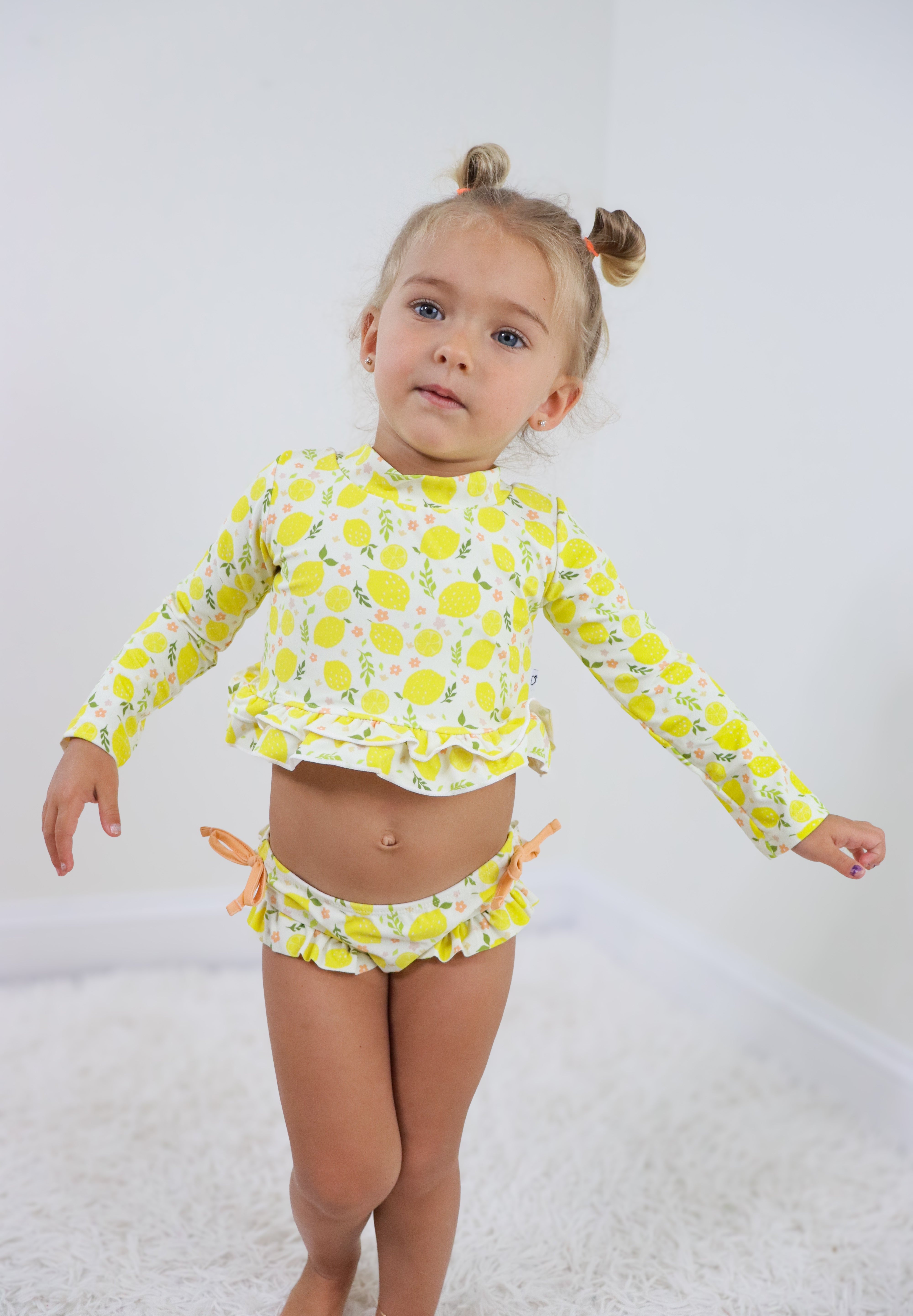 LEMON BLOSSOMS DREAM RASH GUARD RUFFLE TWO-PIECE SWIM SUIT