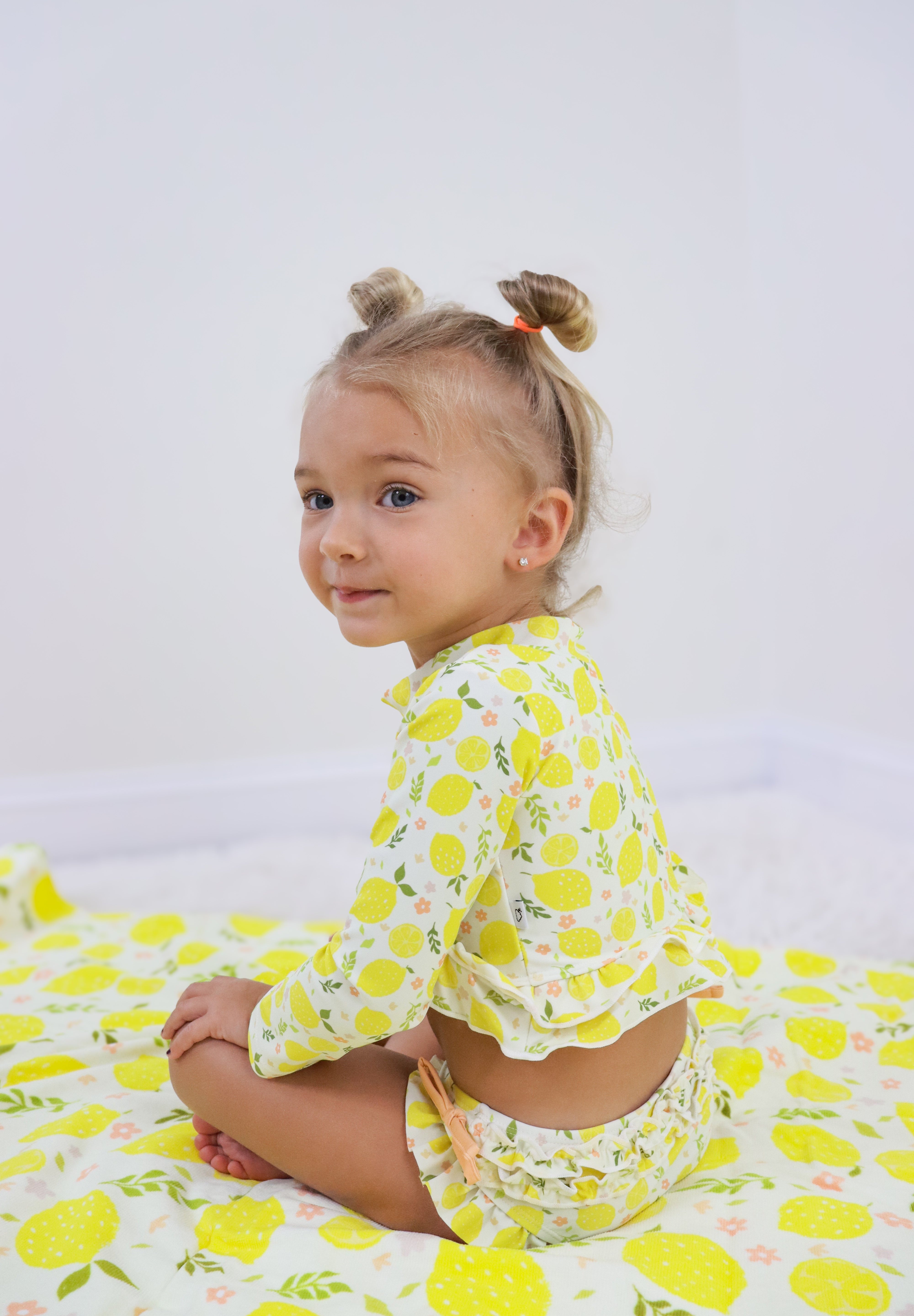 LEMON BLOSSOMS DREAM RASH GUARD RUFFLE TWO-PIECE SWIM SUIT