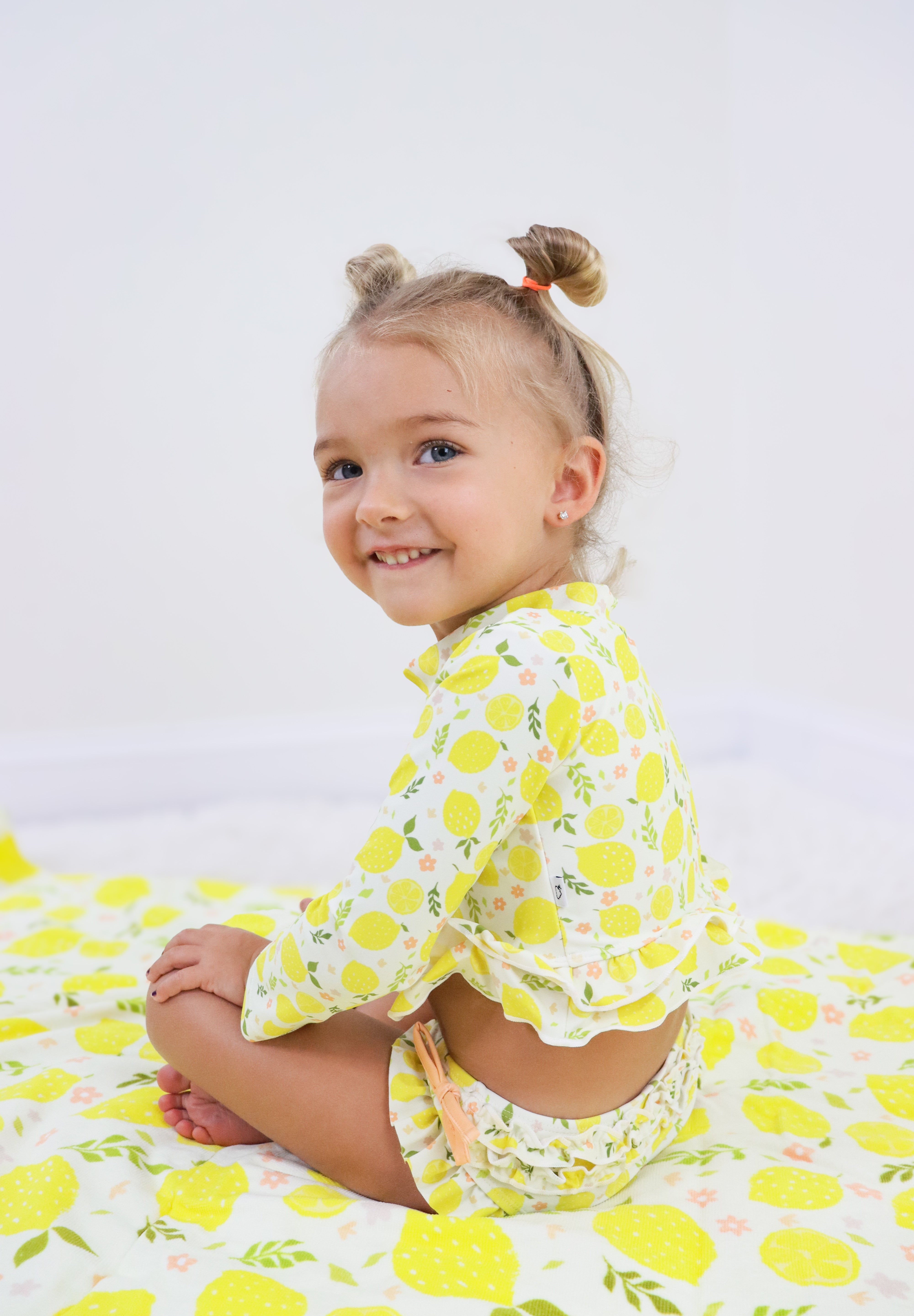 LEMON BLOSSOMS DREAM RASH GUARD RUFFLE TWO-PIECE SWIM SUIT