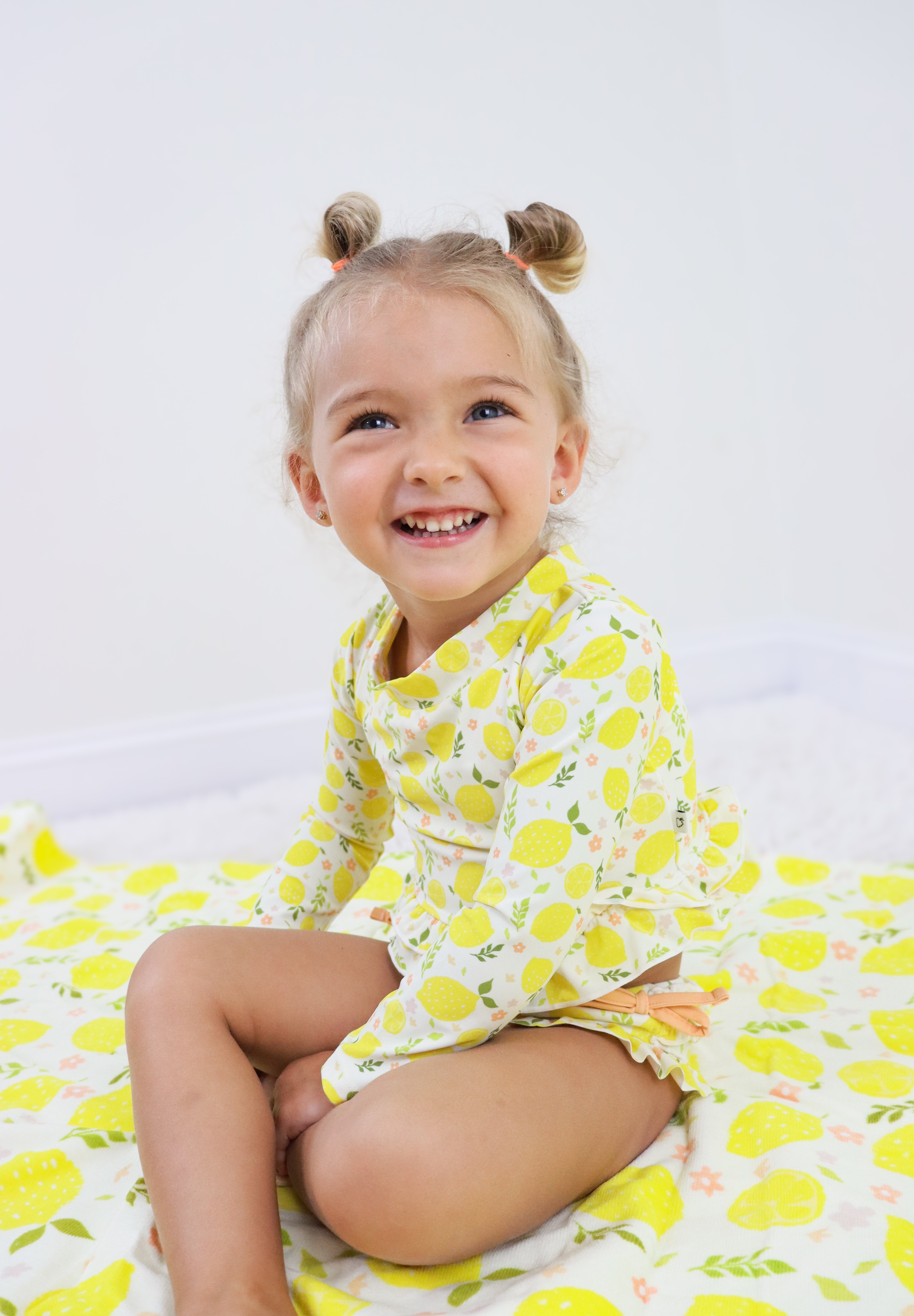 LEMON BLOSSOMS DREAM RASH GUARD RUFFLE TWO-PIECE SWIM SUIT