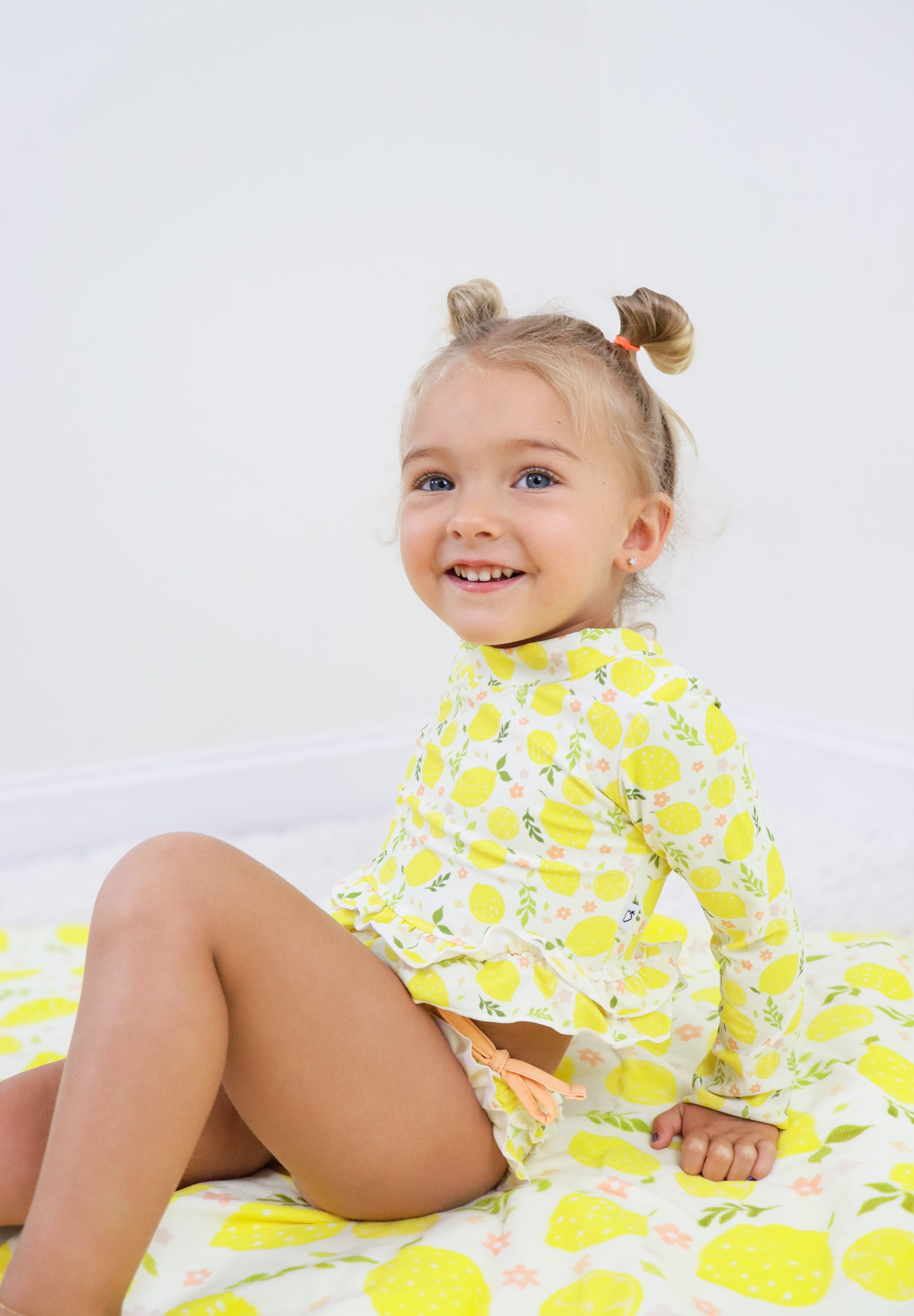LEMON BLOSSOMS DREAM RASH GUARD RUFFLE TWO-PIECE SWIM SUIT