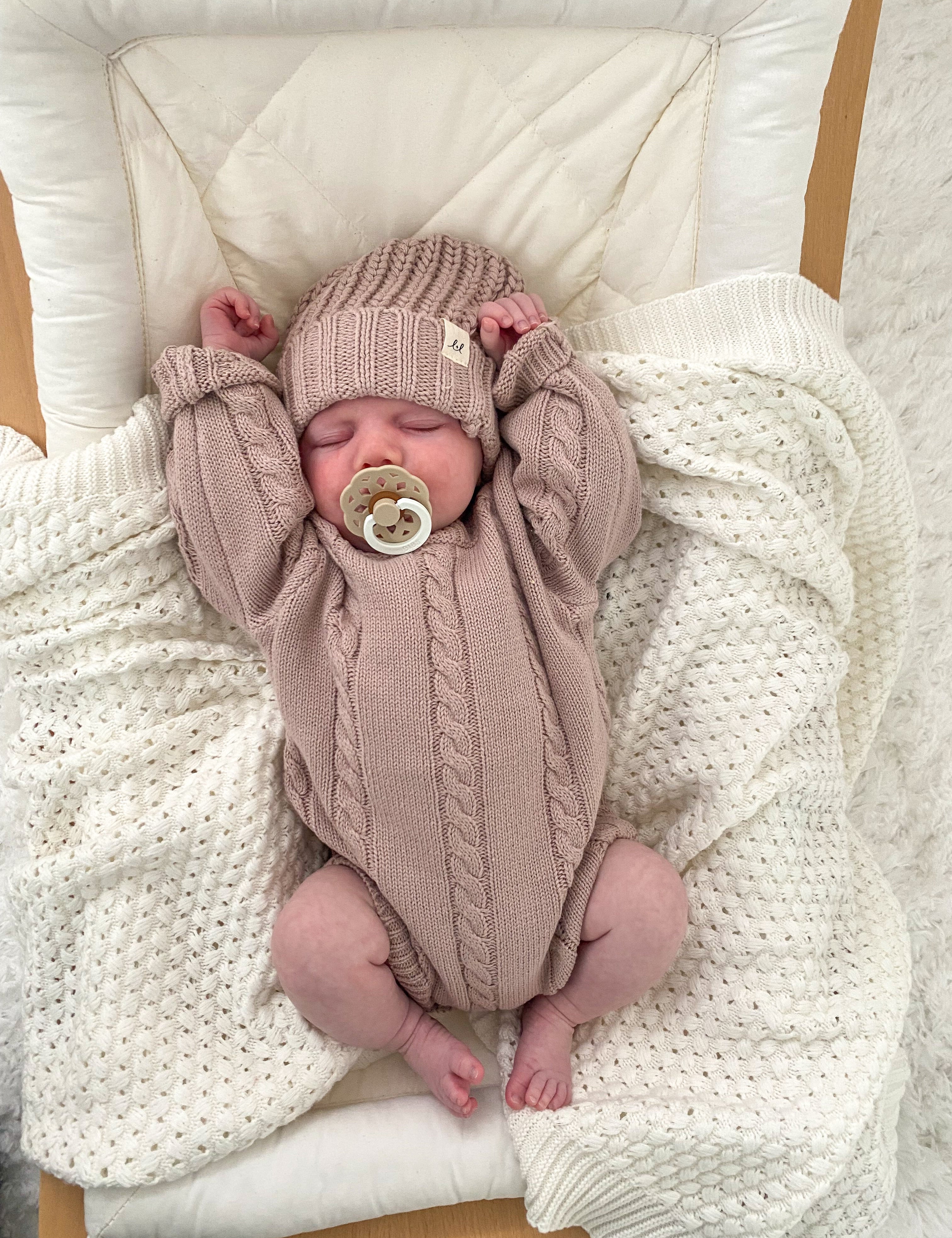 CableKnitRomper-DustyPetal1.jpg