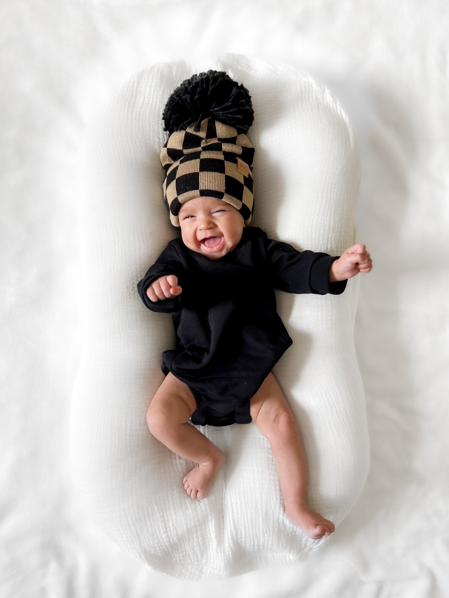 The Newborn Beanie — Black + Mocha Checkered