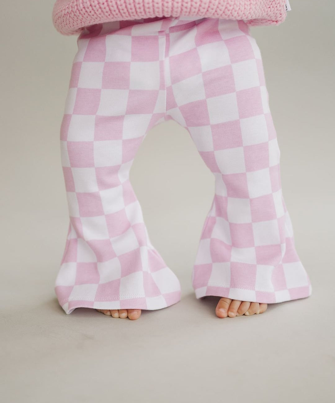 checkered-flare-pants-pink-543821.jpg