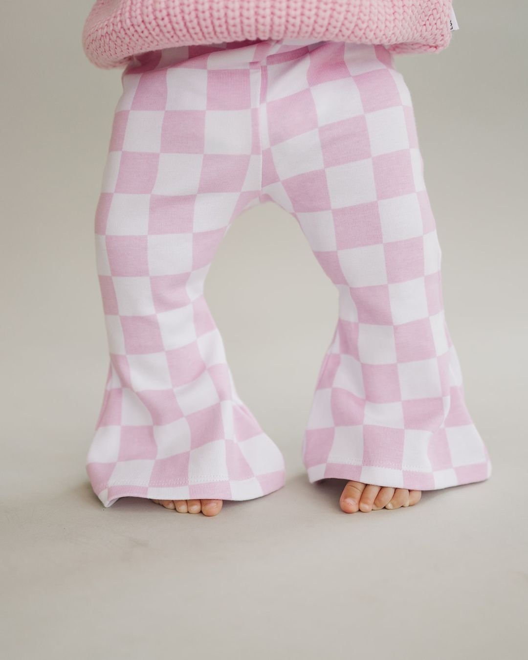 checkered-flare-pants-pink-543821.jpg
