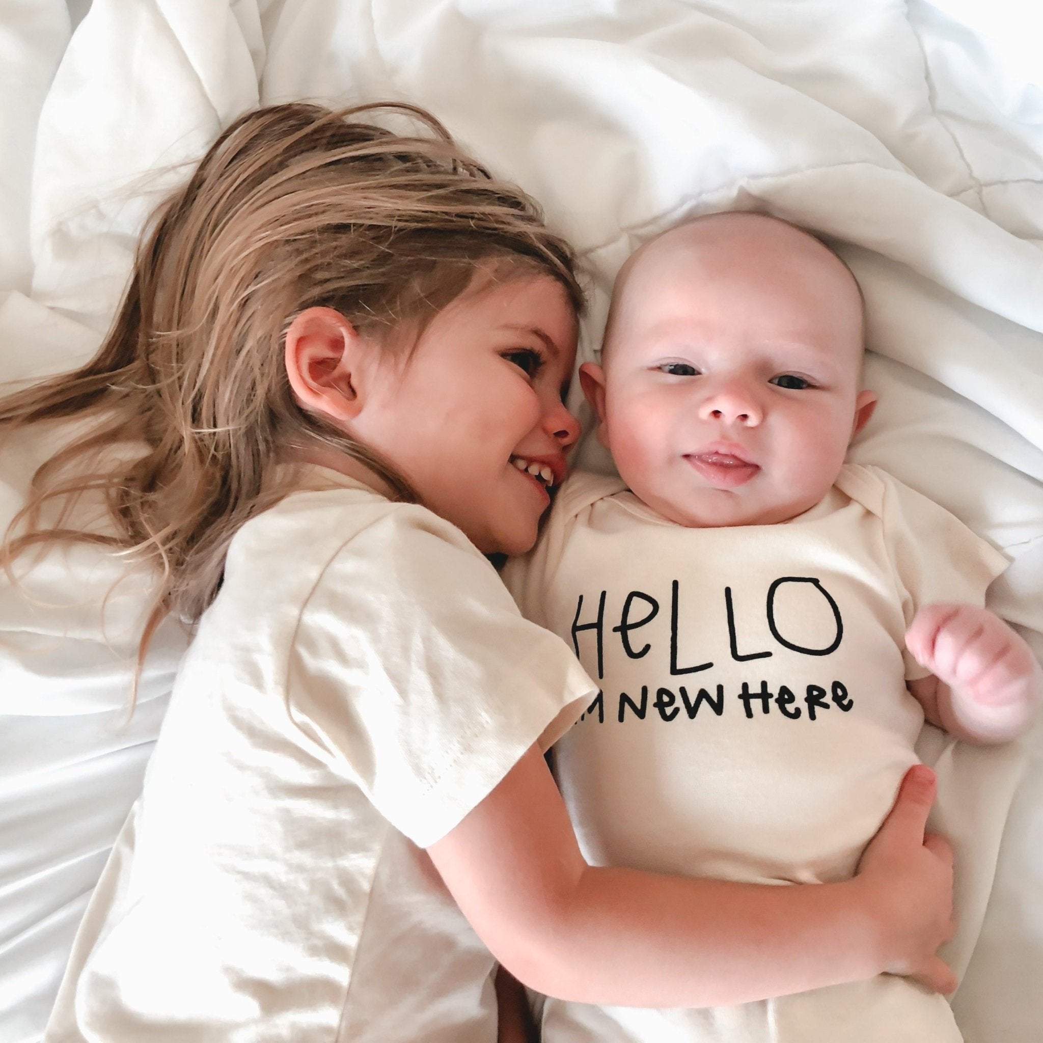 hello-im-new-here-organic-cotton-bodysuit-328912.jpg