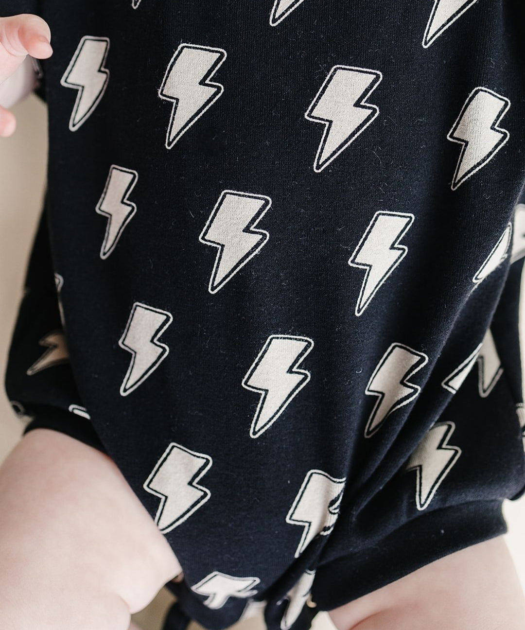 short-sleeve-bubble-romper-black-bolts-911457.jpg