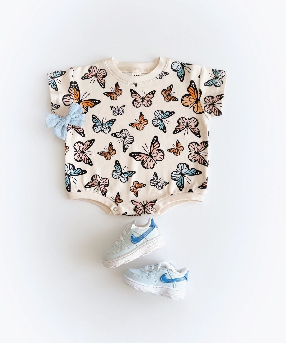 short-sleeve-bubble-romper-butterflies-691362.jpg