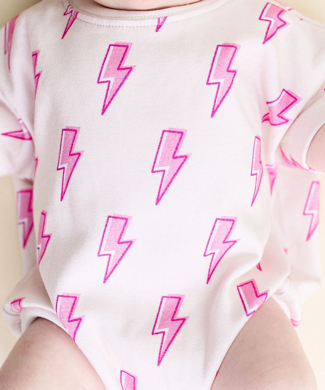 short-sleeve-bubble-romper-pink-bolts-142047.jpg