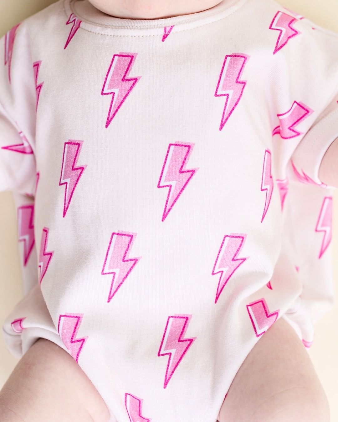 short-sleeve-bubble-romper-pink-bolts-142047.jpg