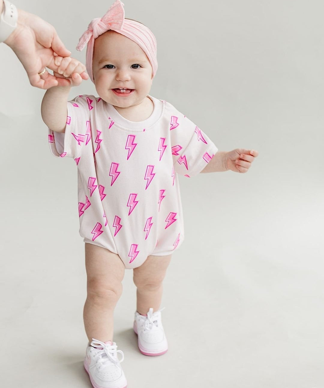 short-sleeve-bubble-romper-pink-bolts-754010.jpg