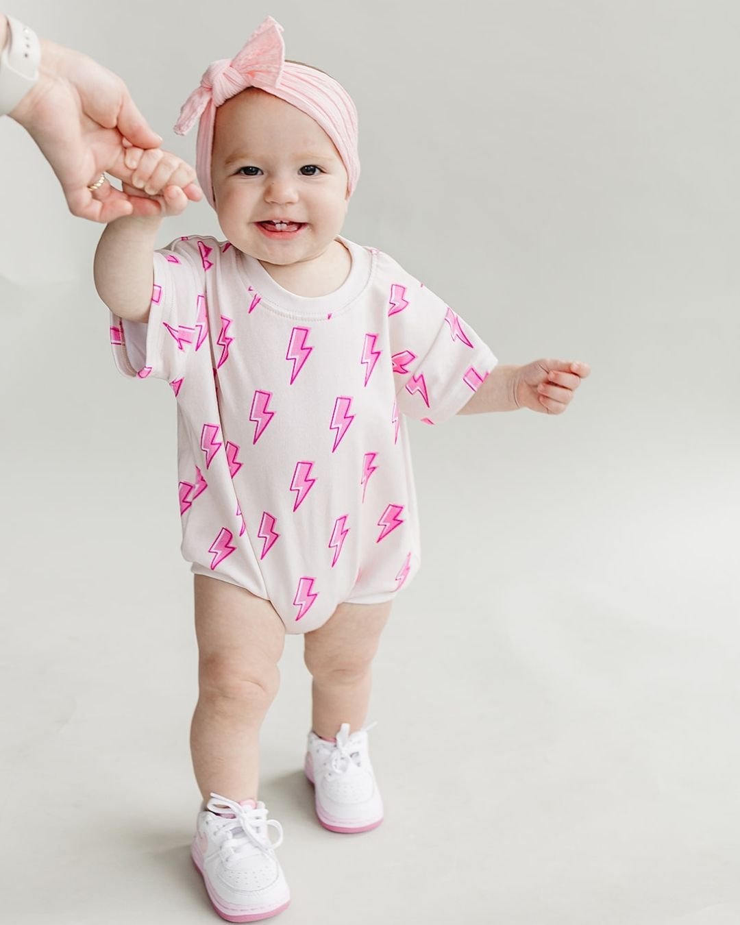 short-sleeve-bubble-romper-pink-bolts-754010.jpg